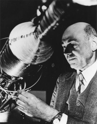 Dr. Robert H. Goddard with Rocket